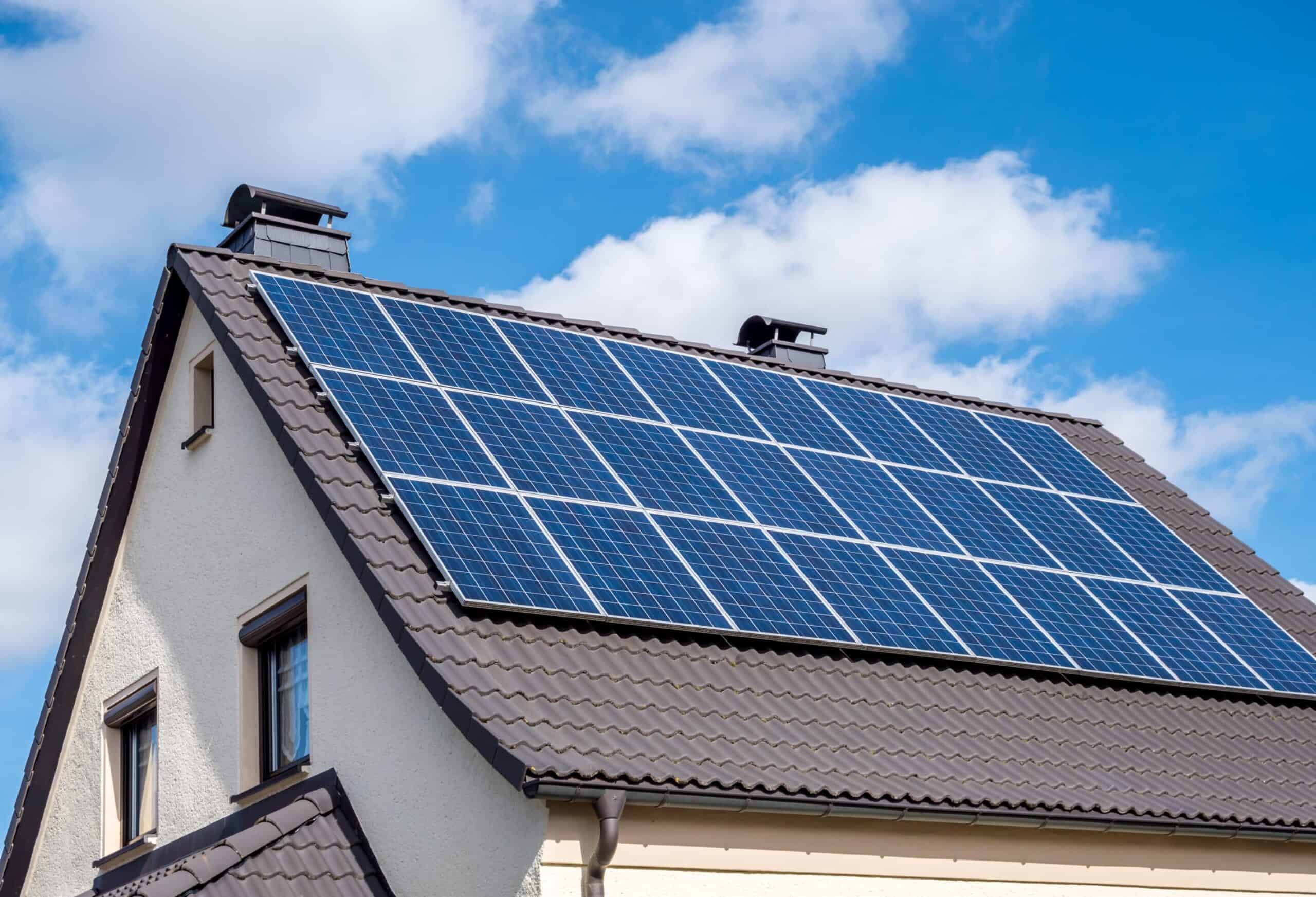 services-03 white-home-scallop-roof-and-solar-panels-shutterstock-1336991930-scaled-1-scaled